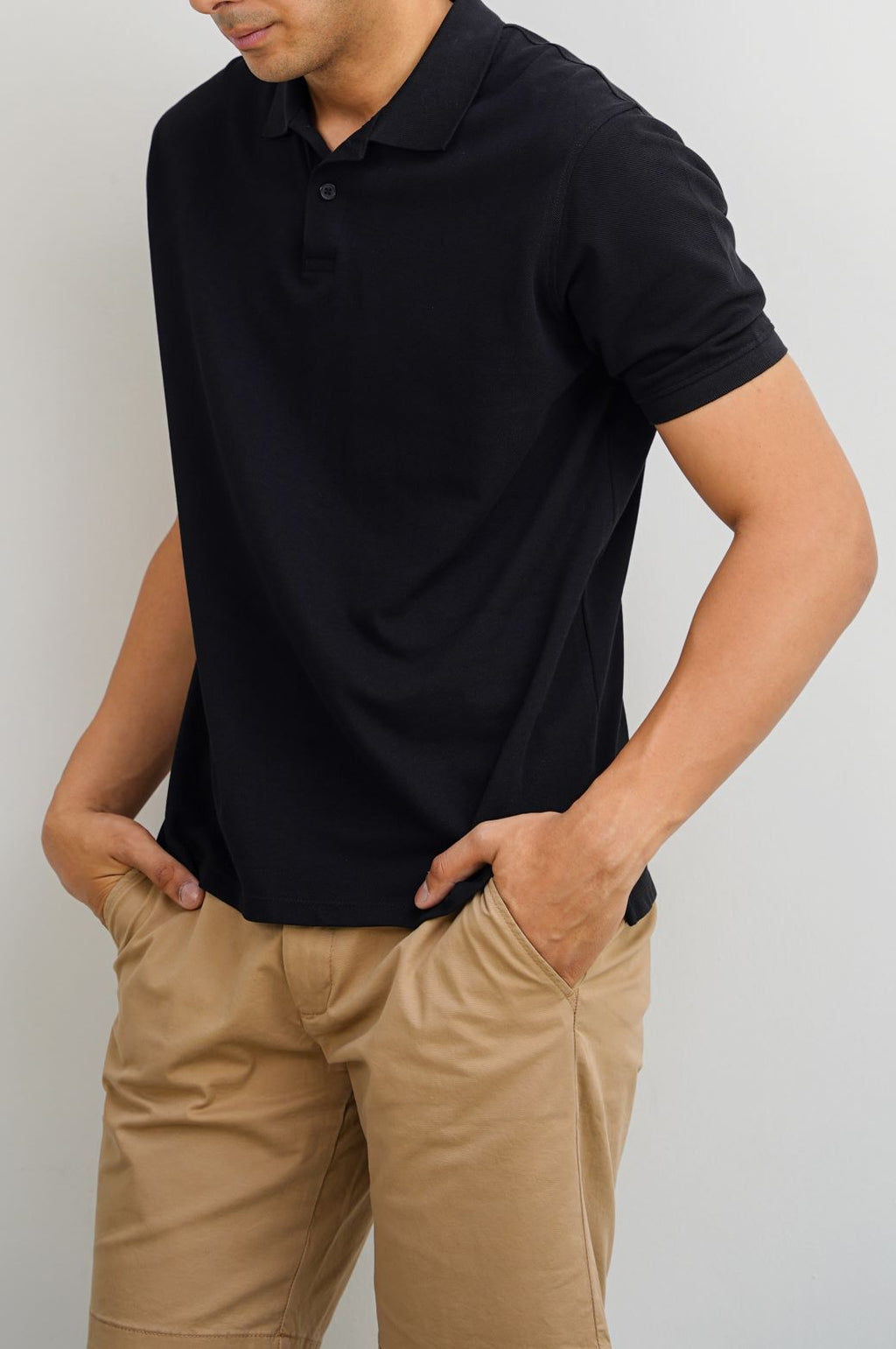 BLACK KNITTED COTTON POLO