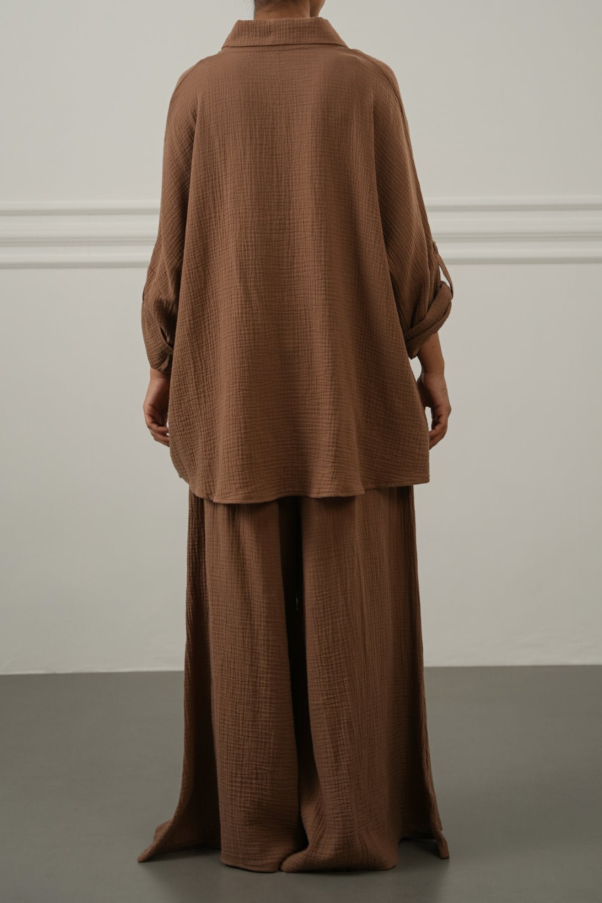 BROWN SMOCKED WAIST MUSLIN PANTS
