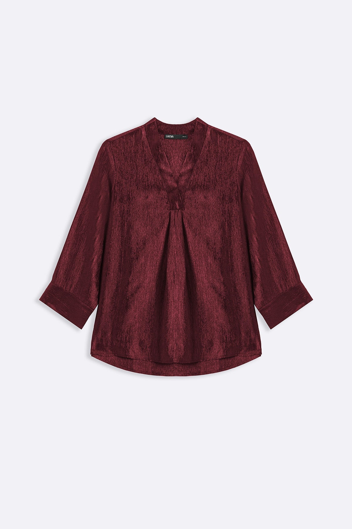 RUST TEXTURED FLOWY V NECK TOP