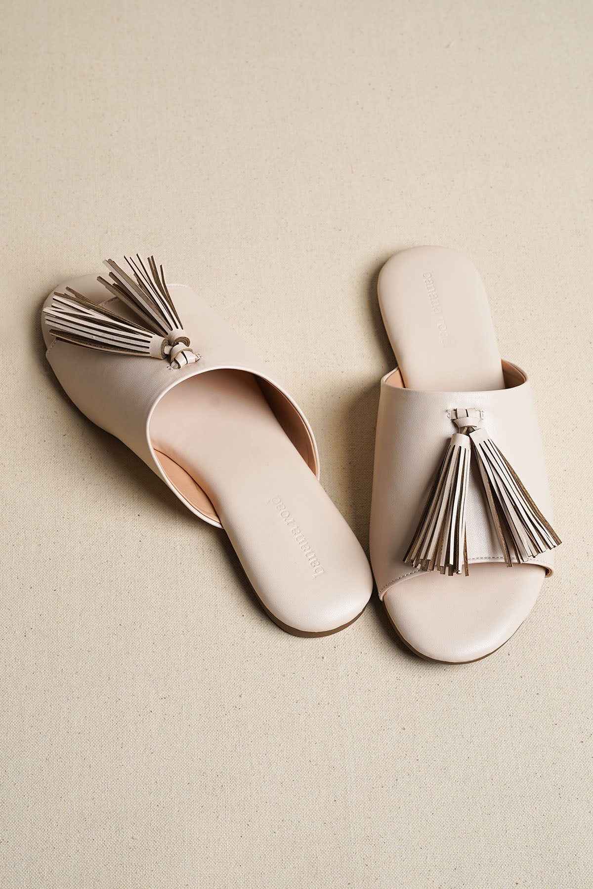 OFF WHITE TROPIC TASSEL SLIDES
